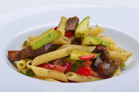 Pasta with shrimps, herbs and mashrooms isolated on white background in studioの写真素材