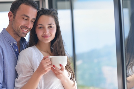 romantic happy young couple relax at homeの写真素材