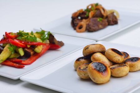 grilled fresh meat and vegetables organic healthy food isolated on white backgroundの写真素材