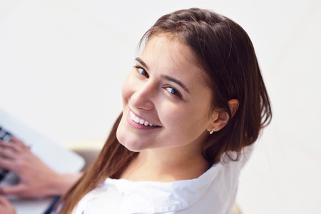 beautiful young woman relax and work on laptop computer modern  home officeの写真素材