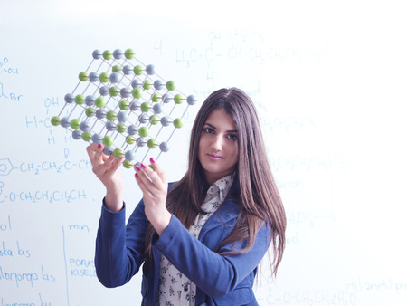 happy collage  school girl student portrait in  classrom and libraryの写真素材