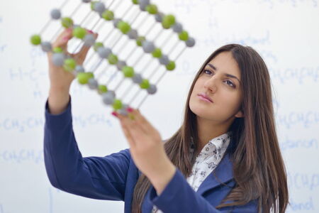happy collage  school girl student portrait in  classroom and libraryの写真素材