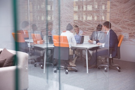 young business people group have meeting and working in modern bright office indoor young business people group have meeting and working in modern bright office indoor