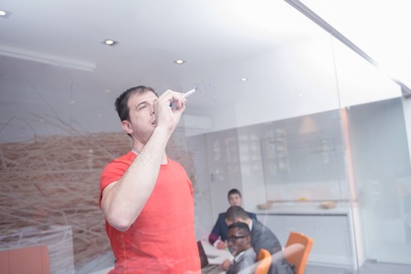 young business people group have meeting and working in modern bright office indoorの写真素材