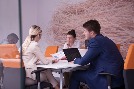 young business people group have meeting and working in modern bright office indoorの写真素材