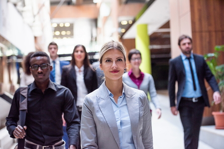 young multi ethnic business people group walking standing and top viewの写真素材