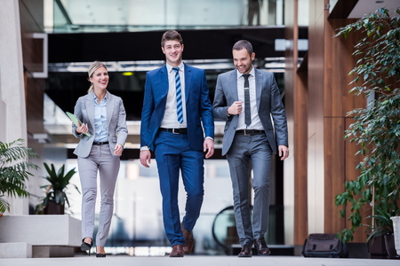 young multi ethnic business people group walking standing and top viewの写真素材