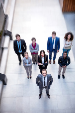 young multi ethnic business people group walking standing and top viewの写真素材