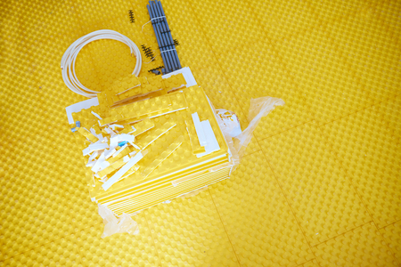 yellow underfloor heating posed in a under construction buildingの写真素材