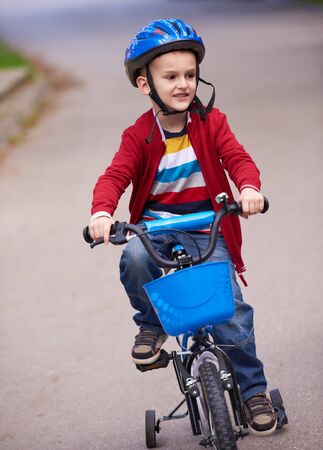 Young boy on the bicycle at Parkの写真素材