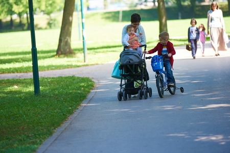 mother and baby in parkの写真素材