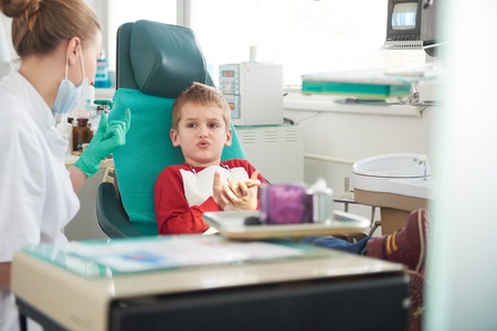 Young boy in a dental surgery teeth chechの写真素材