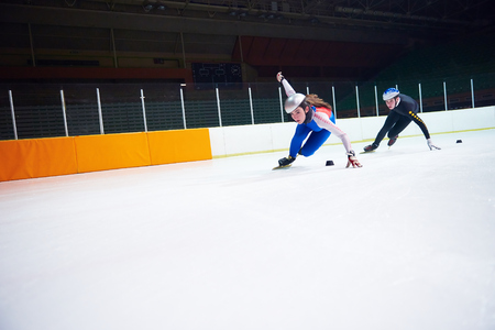 speed skating sport with young athletesの写真素材