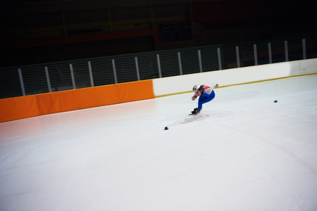 speed skating sport with young athletesの写真素材