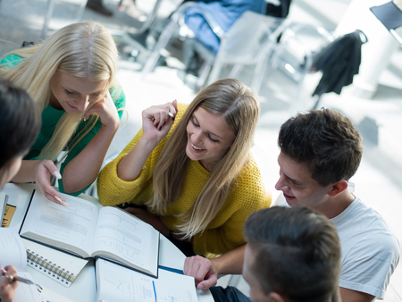 happy students group  study in classroom