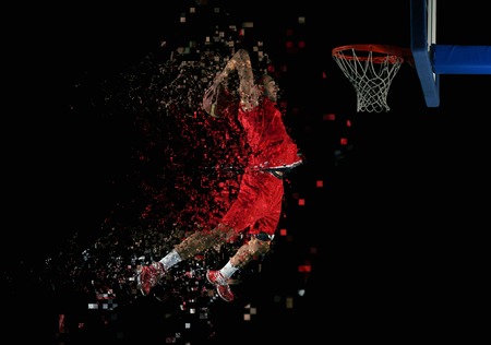 basketball game sport player in action isolated on black backgroundの写真素材