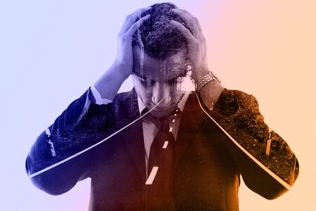 double exposure of business man and nature road way. Portrait of a young businessman looking depressed from work isolated over white background in studioの写真素材