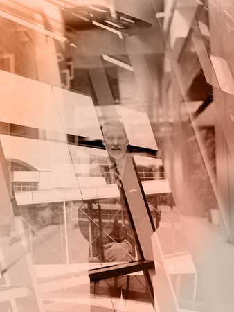 Double exposure design. Portrait of senior business man with grey beard and hair alone i modern...