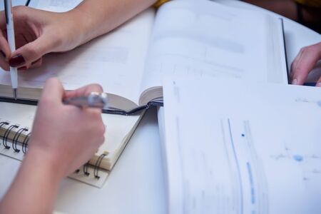 happy students group  study in classroomの写真素材