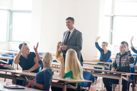 group of students with teacher on class learning lessonsの写真素材