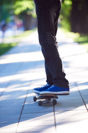 urban scene, closeup of skateboard jumpの写真素材