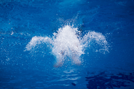 swimmer excercise on indoor swimming pool, sport and health conceptの写真素材