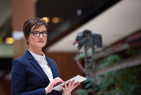 corporate business woman working on tablet computer  at modern office interior