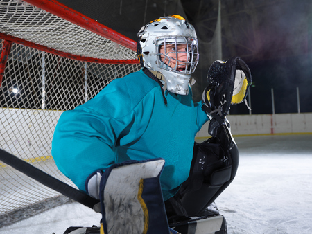ice hockey goalkeeper  player on goal in actionの写真素材