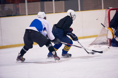 ice hockey sport players in action, business comptetition concpetの写真素材