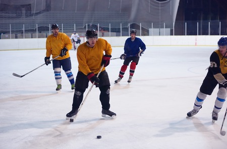 ice hockey sport players in action, business comptetition concpetの写真素材