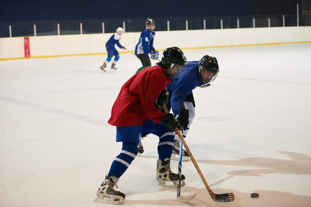 ice hockey sport players in action, business comptetition concpetの写真素材