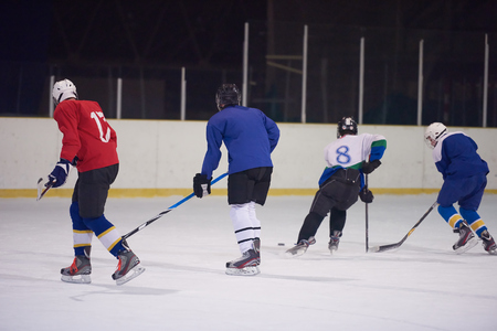 ice hockey sport players in action, business comptetition concpetの写真素材