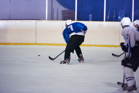 ice hockey sport players in action, business comptetition concpetの写真素材