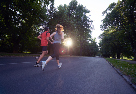 urban sports healthy couple joggingの写真素材