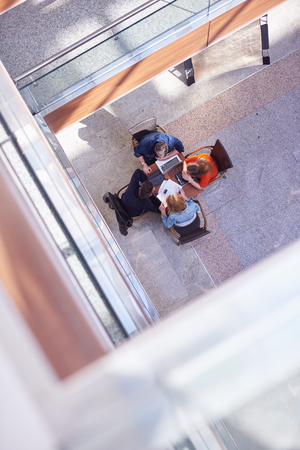 students group working on school  project  together at modern university, top view teamwork business conceptの写真素材