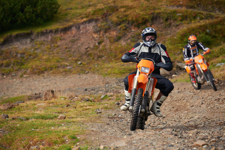 amateur motocross drivers have hobby ride on mountains roadの写真素材