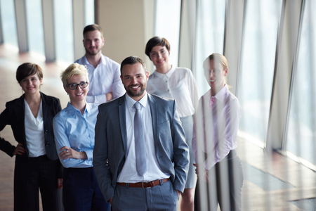 diverse business people group standing together as team  in modern bright office interiorの写真素材