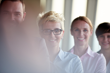 diverse business people group standing together as team  in modern bright office interiorの写真素材