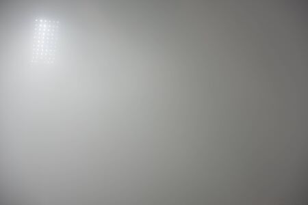 soccer stadium lights reflectors against black backgroundの写真素材