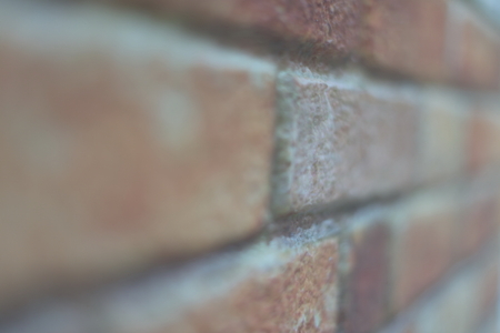 background of old vintage brick wallの写真素材
