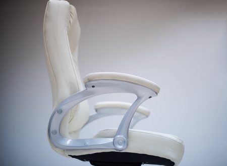 modern white office chair furiniture in empty startup business spaceの写真素材