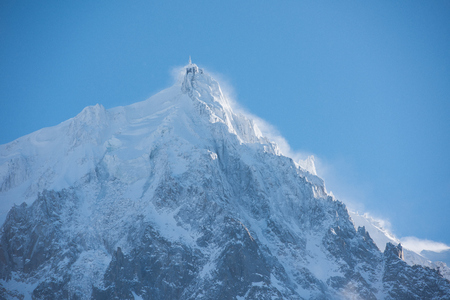 French alps mountain peaks covered with fresh snow. Winter landscape nature scene on beautiful sunny winter day.の写真素材