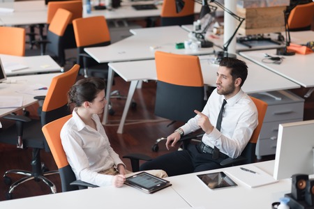 business couple working together on project at modern startup office