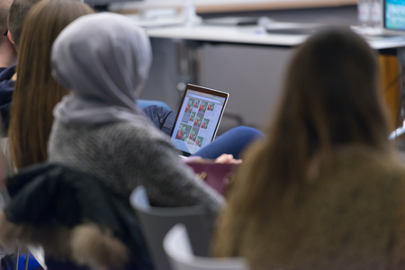 it students on workshop  listening  presentation and taking notes on laptop computerの写真素材