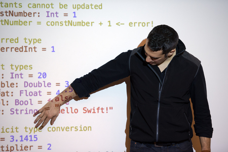 young computer technology students on  code programming class have presentation