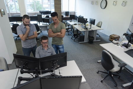 startup business people group working as team to find  solution to problem