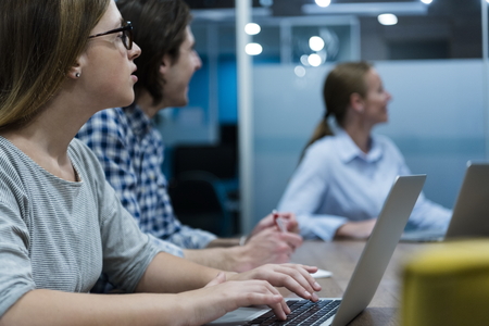 startup business team brainstorming on meeting   working on laptop and tablet computerの写真素材
