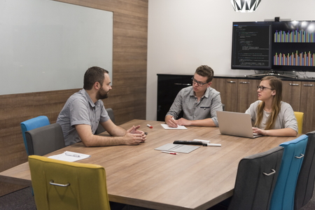 startup business team brainstorming on meeting   working on laptop and tablet computerの写真素材