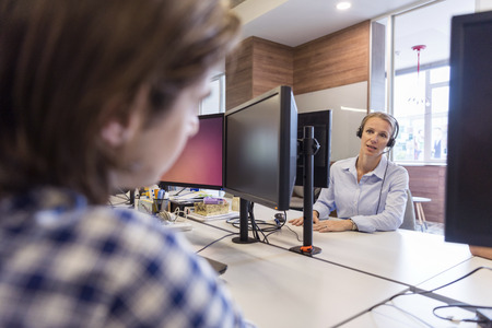 young business people at modern office workplace  getting social in free timeの写真素材