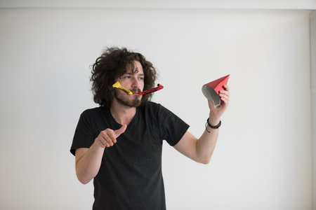 young man on party celebrating new year and dancingの写真素材